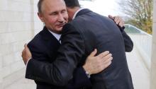Putin Assad hug